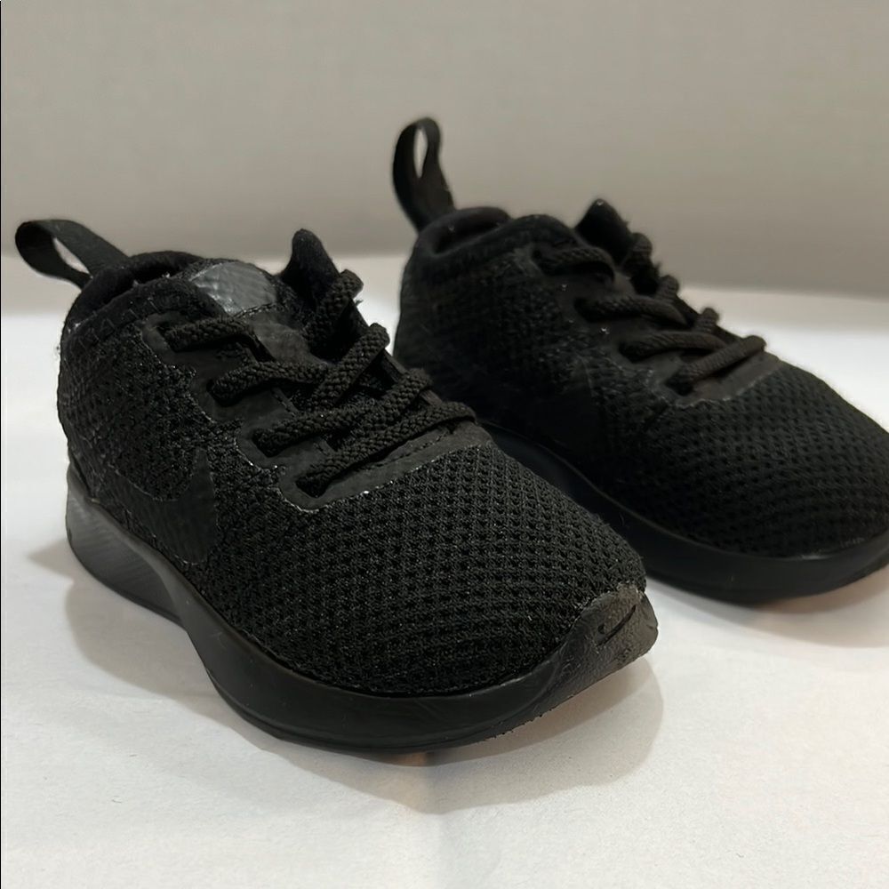 Nike Black pull on sneakers size 4C NWOT